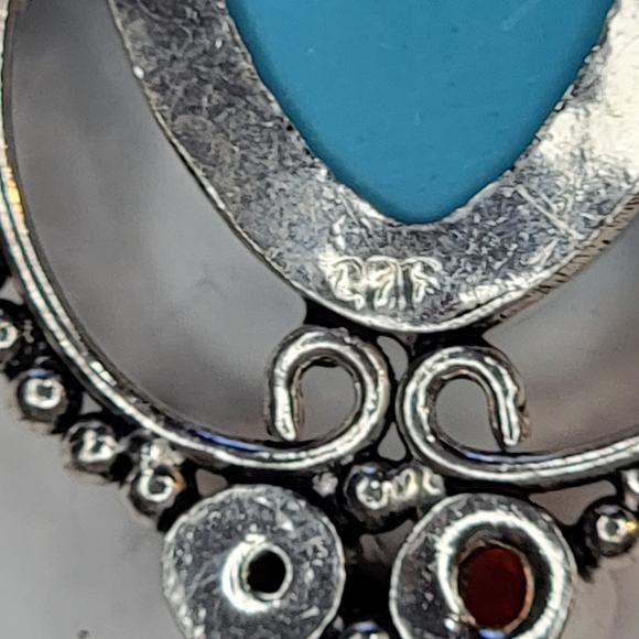 Sterling Silver Pendant with Blue Carved Face and Garnet Accents - Picture 6 of 12